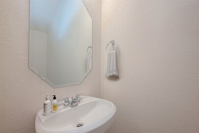 Half bath is located in the entry area.