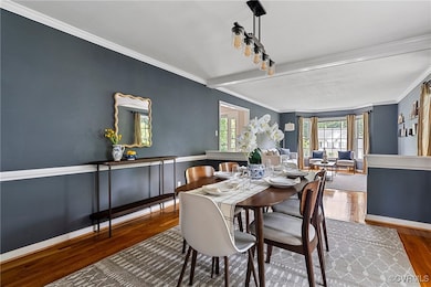 Dining is open to the living room for entertaining