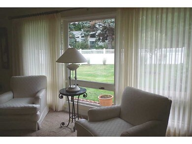 Living Room. Enjoy the change of seasons through t