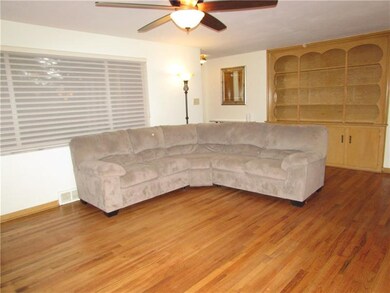 A Large Front Window fills the room with Natural L
