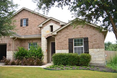 View of front of property featuring stone siding 