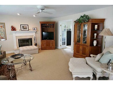 Family Room. The family room features a fireplace 