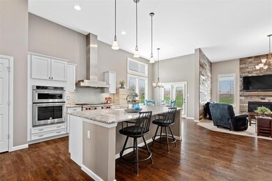 Stunning chef's kitchen with a center breakfast ba
