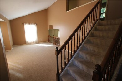 Wall to wall carpeting throughout living room area