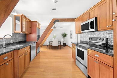 Cherry kitchen, granite and new stainless applianc
