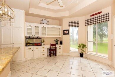 Breakfast nook with natural lighting and large win