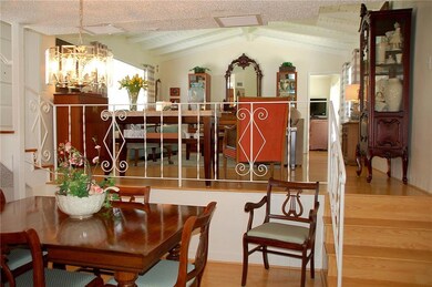 Lower level dining room looking up to the main lev