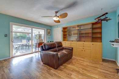 Home has Formal Living and Casual Family Room next
