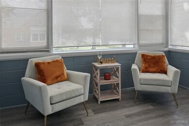 Living area with wood finished floors