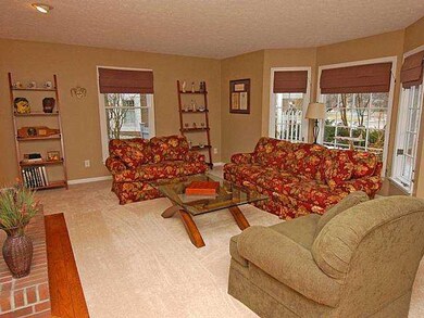 Living Room. The living room offers new carpet and