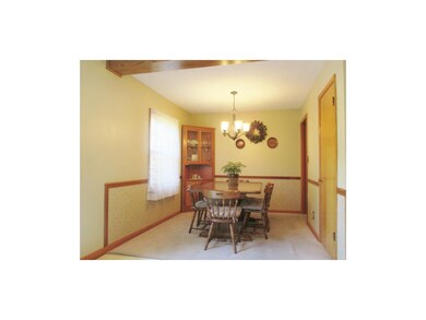 BRIGHT DINING ROOM WITH CLOSET FOR EXTRA STORAGE.