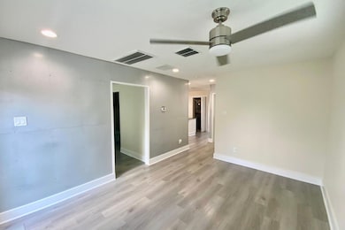 Unfurnished room featuring light wood-type floori