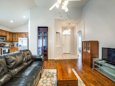 Living room with ceiling fan, hardwood / wood-styl