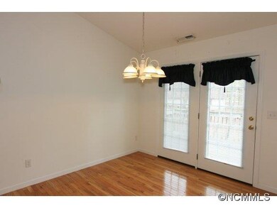 Diningroom facing door to deck