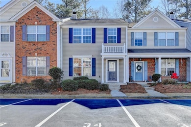 Multi unit property featuring uncovered parking, b