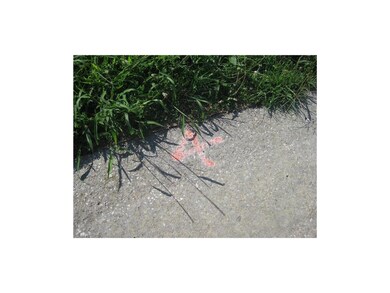 Lot number is marked at the curb.