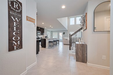 he open-concept layout seamlessly connects the kit