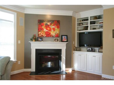 Family Room has a corner gas fireplace and media c