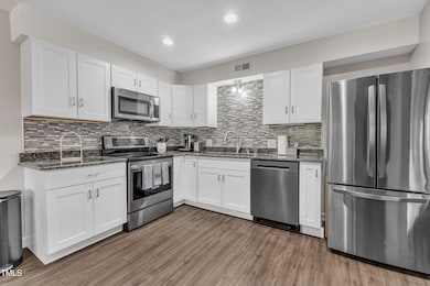 5022 Flint Ridge Place, Raleigh, NC 27609 - photo 7