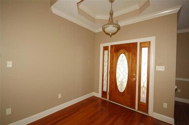 Foyer with leaded-glass front door