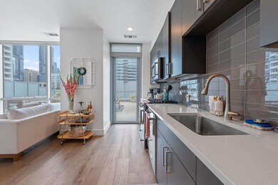 Kitchen with a sink, appliances with stainless st