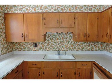 Cafeteria/Kitchen. wood cabinets