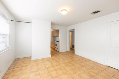 Spare room featuring visible vents and ornamental