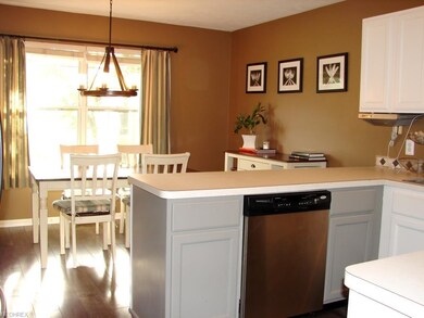 kitchen with view into eat-in area