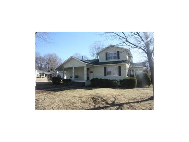 Large corner lot with 2 car garage, covered porch,