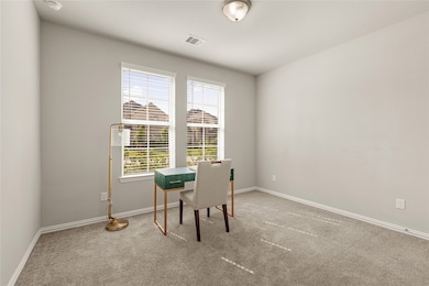 View of one of the bedrooms that can be an office
