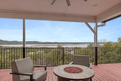 Deck with ceiling fan and a mountain view