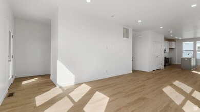 Unfurnished living room with recessed lighting and light wood-style floors