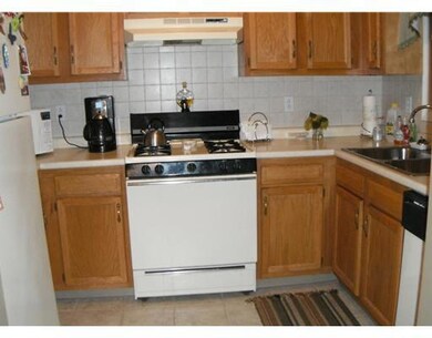 Kitchen. ceramic tile flooring    gas stove and re