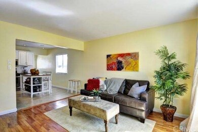 Living Room looking into kitchen...note hardwood f