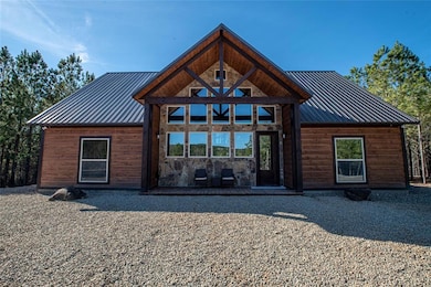 View of front of property with a patio