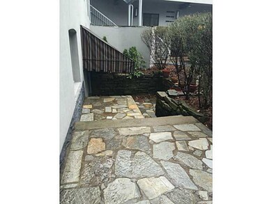 Exterior Front. Private flagstone patio and privat