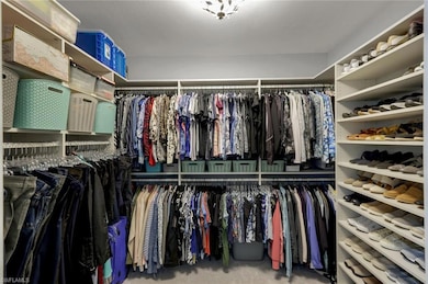 Spacious customized walk-in closet in Master Suite