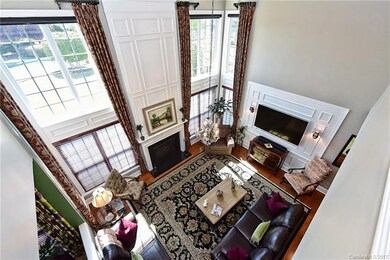 Great Room w/ Floor to Ceiling Windows