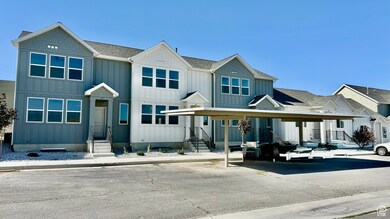 View of front of house featuring board and batten siding, entry steps, and roof with shingles