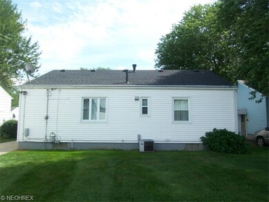 Looking at the rear of the house at 1472 W 12th St
