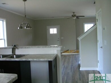 VIEW OF FRONT ENTRY FROM KITCHEN