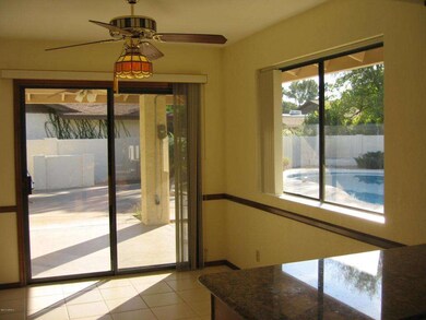Bright Eat-In Area with Chair Rail
