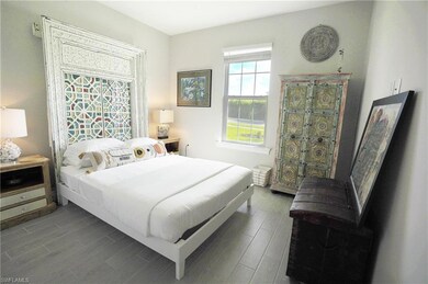 Bedroom featuring wood-type flooring