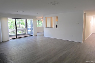 LR view toward Kit & DR. Private balcony!