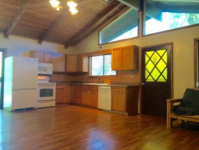 Open main room into kitchen with extra w