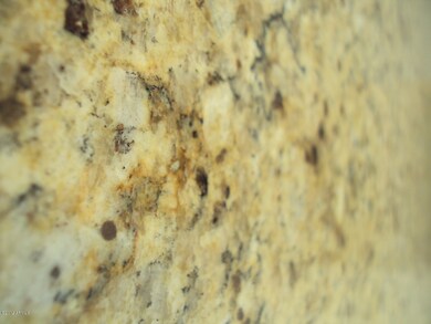 GRANITE IN KITCHEN AND BATHROOMS