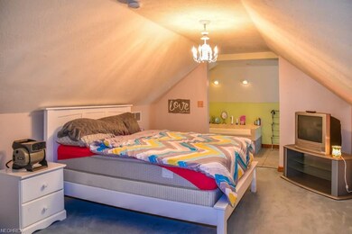 Upstairs master suite offers 2 walk-in closets and