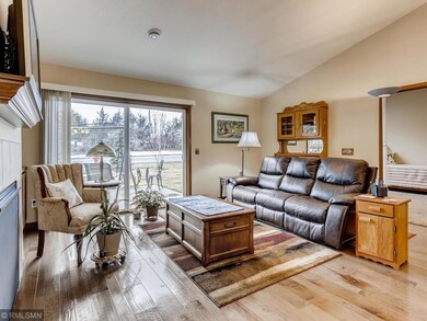 Gorgeous light streams into the living room from t