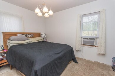 ONE OF TWO MAIN FLOOR BEDROOMS