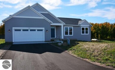 7494 E Meadows Dr unit 14, Cedar, MI 49621 - photo 2